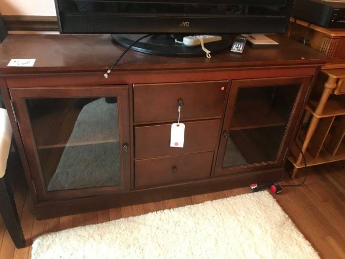 #60	Wood Entertainment Center w/3 drawers  54x16x30	 $75.00 
