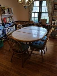 #65	Round Tile-top w/leaf Table w/6 chairs    44x17x30 	 $175.00 
