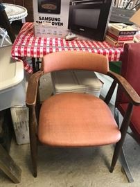 #75	Mid-century orange vinyl Chair	 $20.00 
