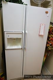 White GE side by side refrigerator