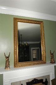 Square gilt mirror with Angle candle holders