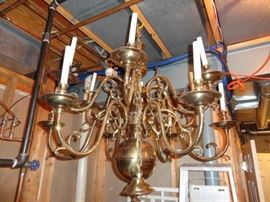 Many elegant brass chandeliers.