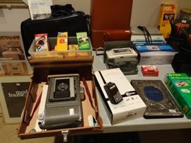 Many vintage cameras, 3-D camera and film