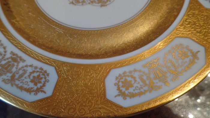 8 gold rim dinner plates...$400.00