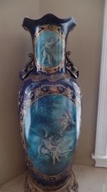 pair over size place urns $1,500 pair approx...44" high
