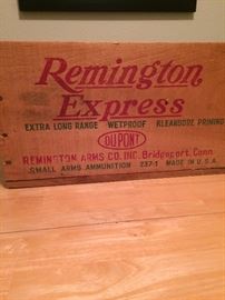 remington ammo  crate.  One listed on e-bay right now.  This appears to be in much better condition.