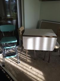 table from 60s with 2 chairs also perfect condition old costco chair