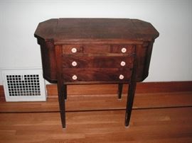 Vintage 1920s White Rotary sewing machine in cabinet