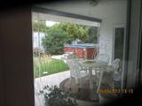 Hot tub with steps, needs new cover, best offer. patio table and 4 chairs.