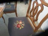 Table and 6 chairs Table has 3 leaves in maple
