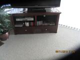 glass topped TV stand dark wood