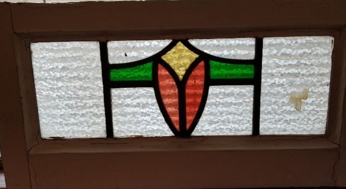 One of three old stain glass windows