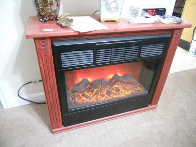 Heat Surge Amish Roll & Glow Electric Fireplace