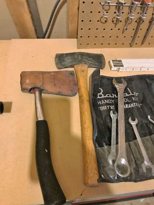  Wall of tools. 2 hatchets. Antique-looking hammer  http://www.ctonlineauctions.com/detail.asp?id=677163