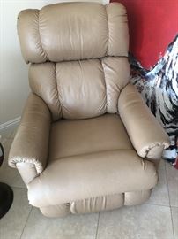 One of two leather recliners
