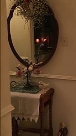 Antique mirror, barley twist table, metal tray, cast iron birds, 