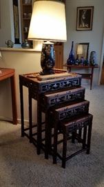 Beautiful hand carved nesting tables.