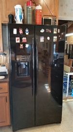 Nice GE Profile side by side refrigerator.