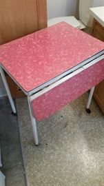 Great mid century drop leaf rolling table.
