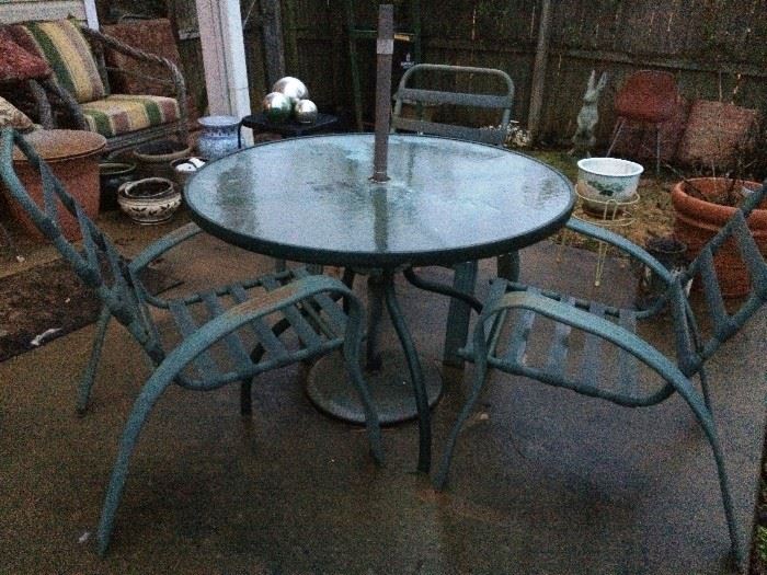 Round Glass Outdoor Table w/3 chairs.  Various Planters.