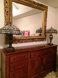 Long Sideboard, Tiffany-Style lamps, Oversized Gilt Mirror