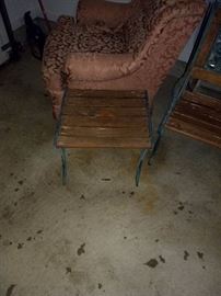 Cast iron and wood table. Chair. And benches