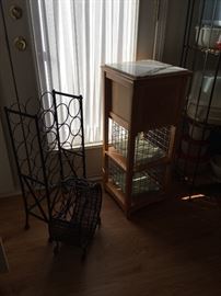 Cute stand with baskets and wine bottle holders
