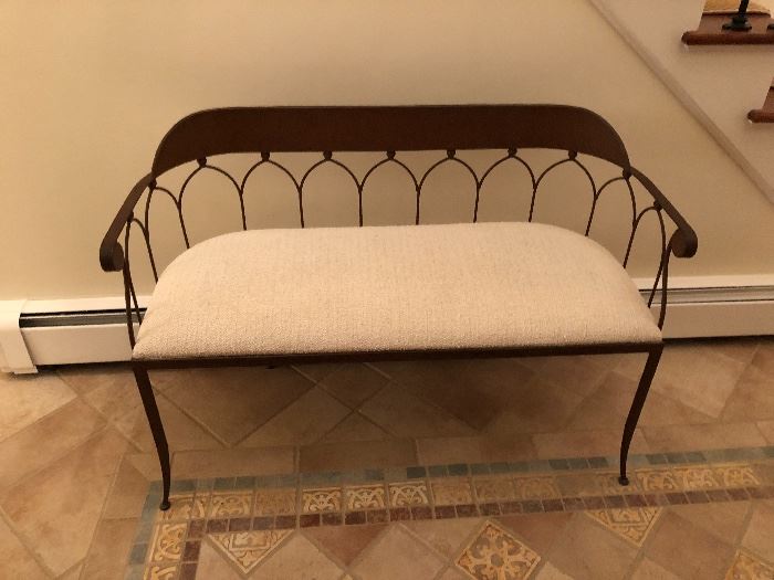 Upholstered seat iron bench