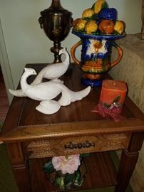 One of two matching end tables, vintage covered urn, art deco birds, and one of two matching brass table lamps. 
