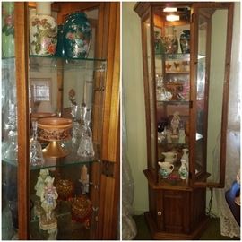 Lighted curio cabinet, vases, Florentine compote, bells, Wedgewood amethyst goblet, and more.