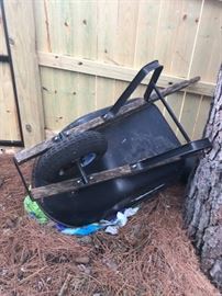 #38 black wheelbarrow $30.00