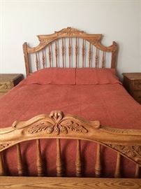 Beautiful carved solid oak bedroom set by Oakwood Interiors. 5 piece set includes Queen bed, 2 nightstands, dresser and floor mirror.