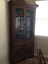 Corner hutch matches dining table