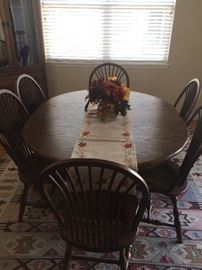 Solid oak dining table and 6 chairs.