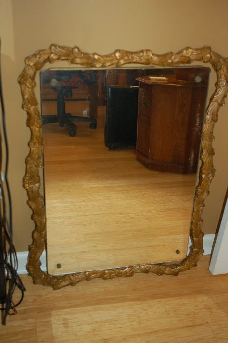 Antique gold framed, ornate mirror
