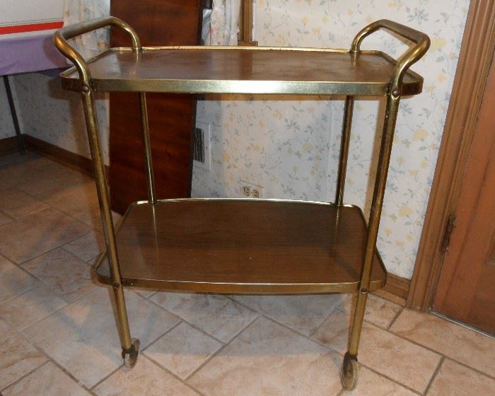 Retro two shelf rolling kitchen cart.  Needs cleaning, or could be painted.