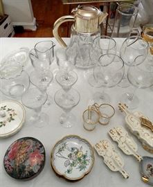 Glassware, crystal stemware, enamel on brass small plates, tabletop decor