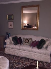 terrific neutral sofa and gilded mirror in the sale