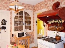 Do you need a vintage, red Vent-A-Hood? OK, how about some vintage Paul Revere cookware - there are two sets!                                                                                                   No, you CANNOT take samples of the fabby wallpaper.