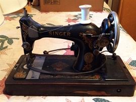 Vintage Singer sewing machine, motor number 4258082, with wooden carrying case; Simanco, USA.
