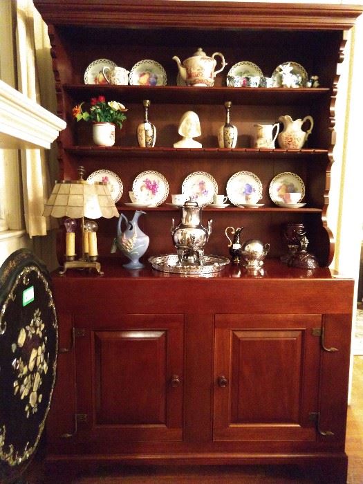 Vintage cherry hutch. It even has slots for your sterling spoon collection. Those crafty Amish, they think of everything!