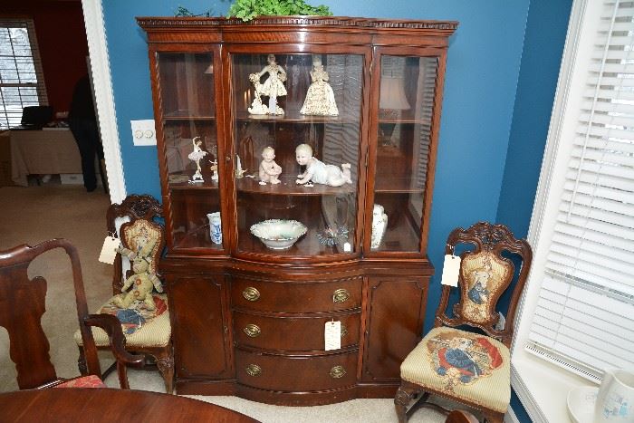 China hutch, pair press back chairs with dog pattern
