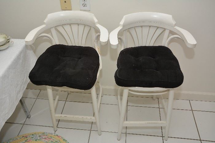 pair white stools with cushions