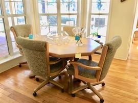 Kitchen table with rolling chairs, Danish-mod punch bowl & cups, champagne ice bucket with colored stem glasses