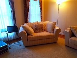 Loveseat, rolling adjustable stand