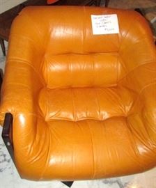 Close up of leather chair- they have some fine ge cracks, but leather is still soft