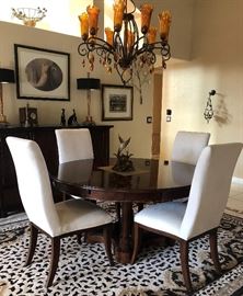 Stanley Dining Room: 60" Round Pedestal Table (perimeter extensions add 18" to overall width) w 6 Off-White Microfiber Chairs, Buffet w Black Granite Top, Sleek Table Lamps w Black and Brass Shades