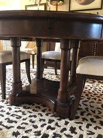 Stanley Dining Room: 60" Round Pedestal Table (perimeter extensions add 18" to overall width) w 6 Off-White Microfiber Chairs, Buffet w Black Granite Top, Sleek Table Lamps w Black and Brass Shades