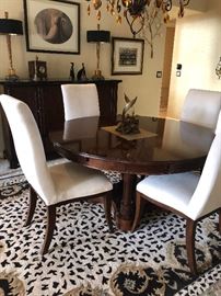 Stanley Dining Room: 60" Round Pedestal Table (perimeter extensions add 18" to overall width) w 6 Off-White Microfiber Chairs, Buffet w Black Granite Top, Sleek Table Lamps w Black and Brass Shades