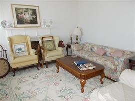 rug, floral sofas, coffee table, Shannon crystal, lamps, lamp tables, wingback  chairs